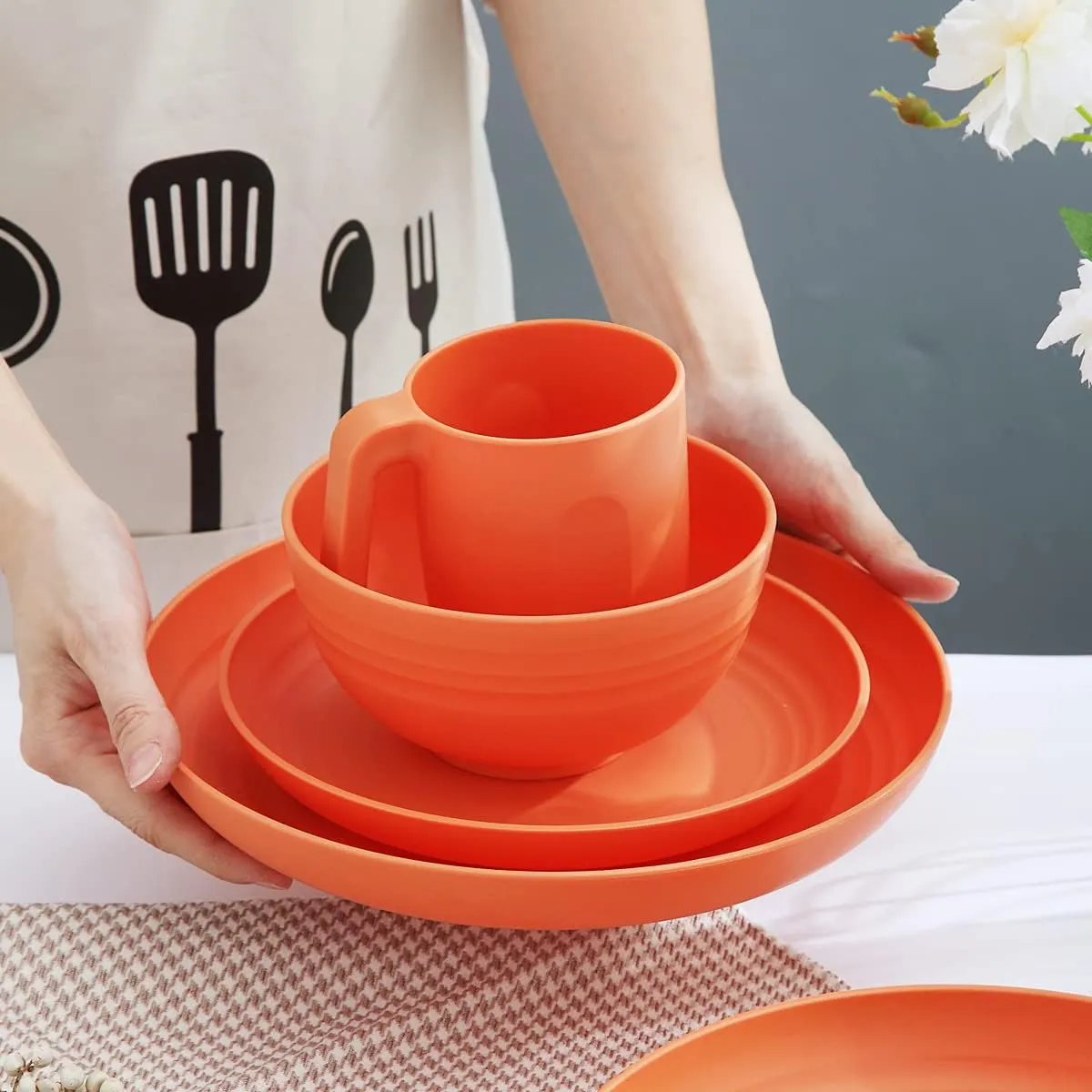 Kyraton Plastic Dinnerware Set of 16 Pieces, Unbreakable And Reusable Light Weight Plates Mugs Bowls Dishes Easy to Carry And Clean Microwave Safe BPA Free Dishwasher Safe Service For 4 (Orange)